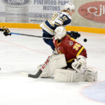 Kirkland Lake Gold Miners forward Max Newnam uses his hand to push the puck past Timmins goalie Tyler Masternak while being hassled by Rock blue-liner Josh Anderson during the second period of Tuesday night’s NOJHL game at the Joe Mavrinac Community Complex. Masternak stopped all 22 shots he faced in the contest to record his NOJHL-record seventh shutout of the season as the Rock went on to blank the Gold Miners 6-0. The Rock, who now hold a one-point lead atop the NOJHL’s overall standings, will host the Powassan Voodoos at the McIntyre Arena on Thursday, at 7:30 p.m. THOMAS PERRY/THE DAILY PRESS/POSTMEDIA NETWORK