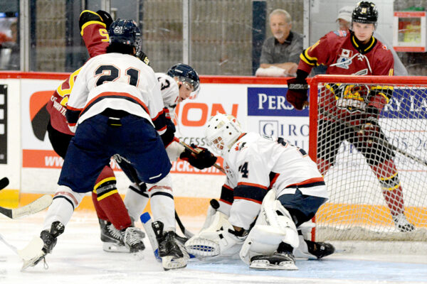 GALLERY: Rock holds off resilient Rapids